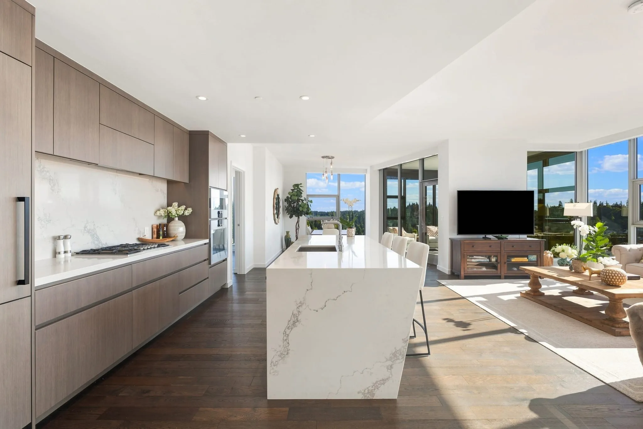 Condo galley kitchen opening to the living space