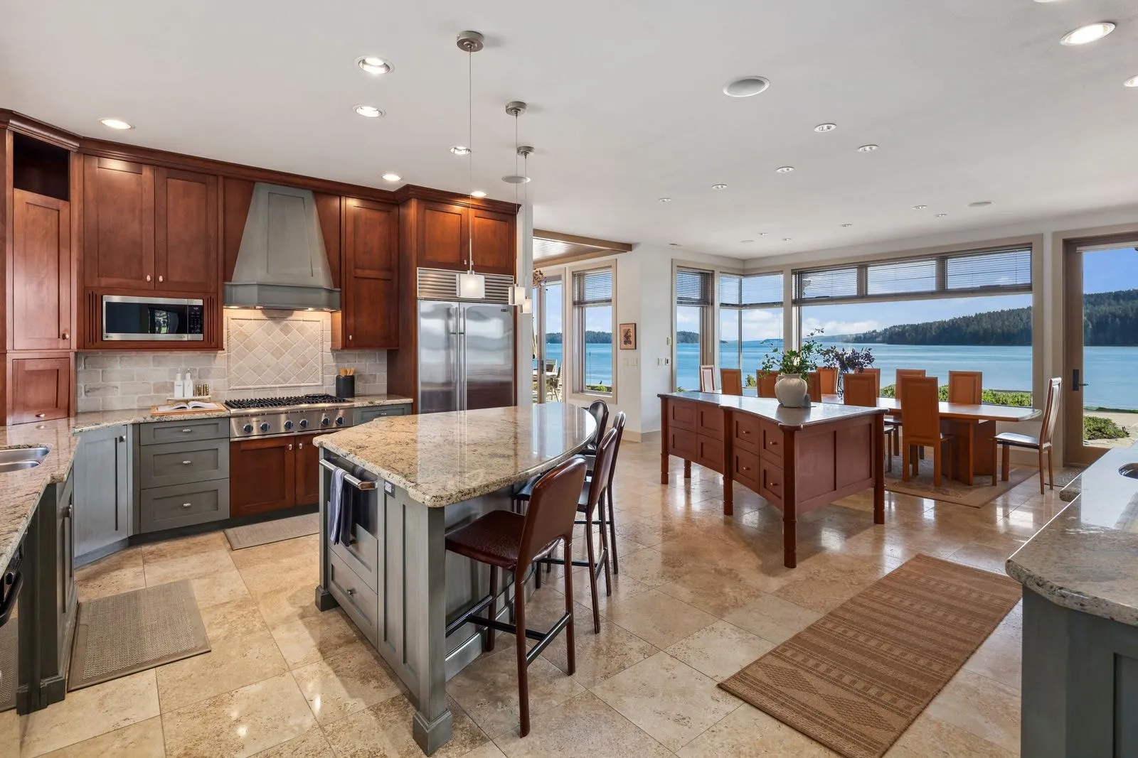Kitchen island looking out over the water, photographed by ACRE Seattle