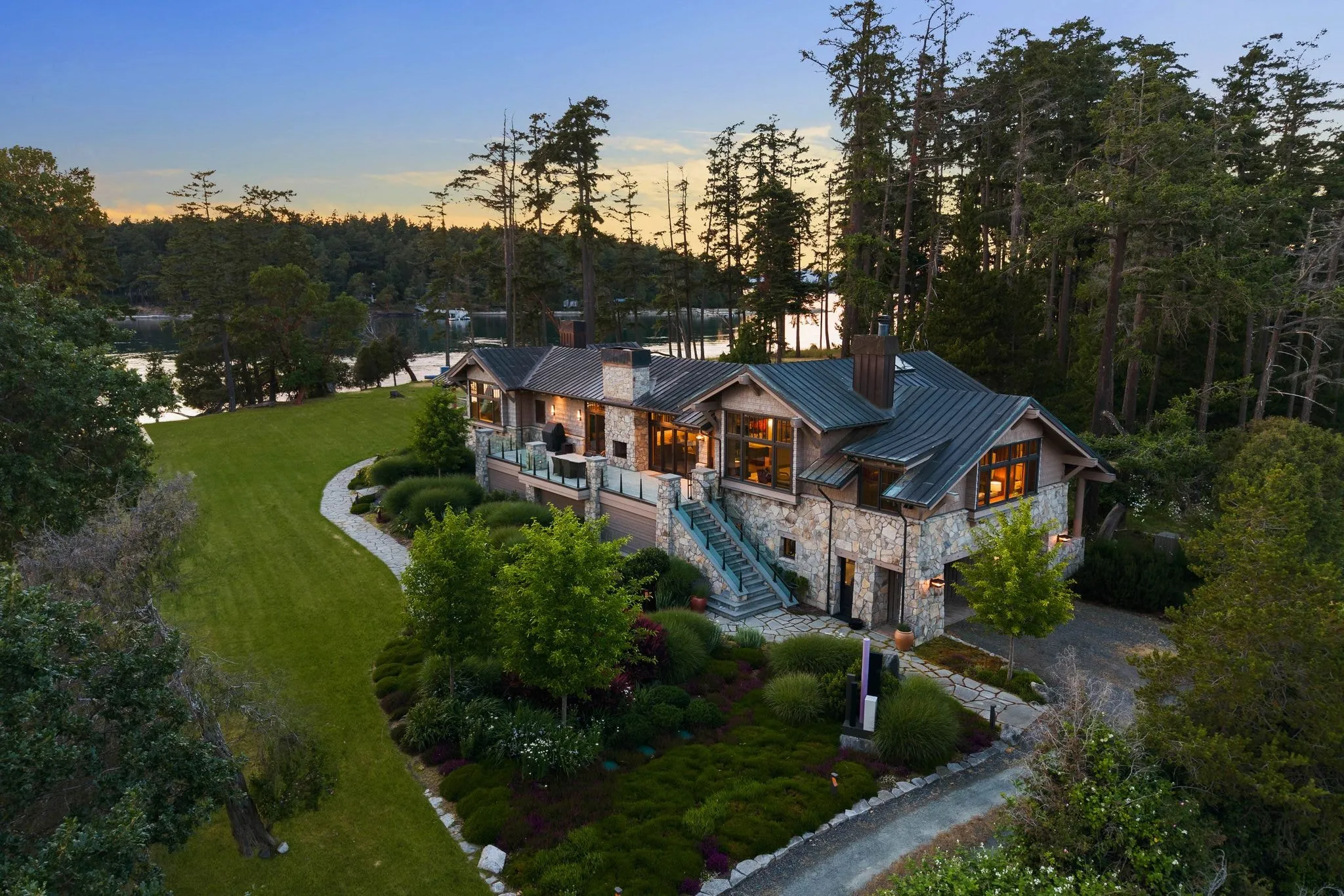Aerial view of a large estate and its full grounds, photographed by ACRE Seattle