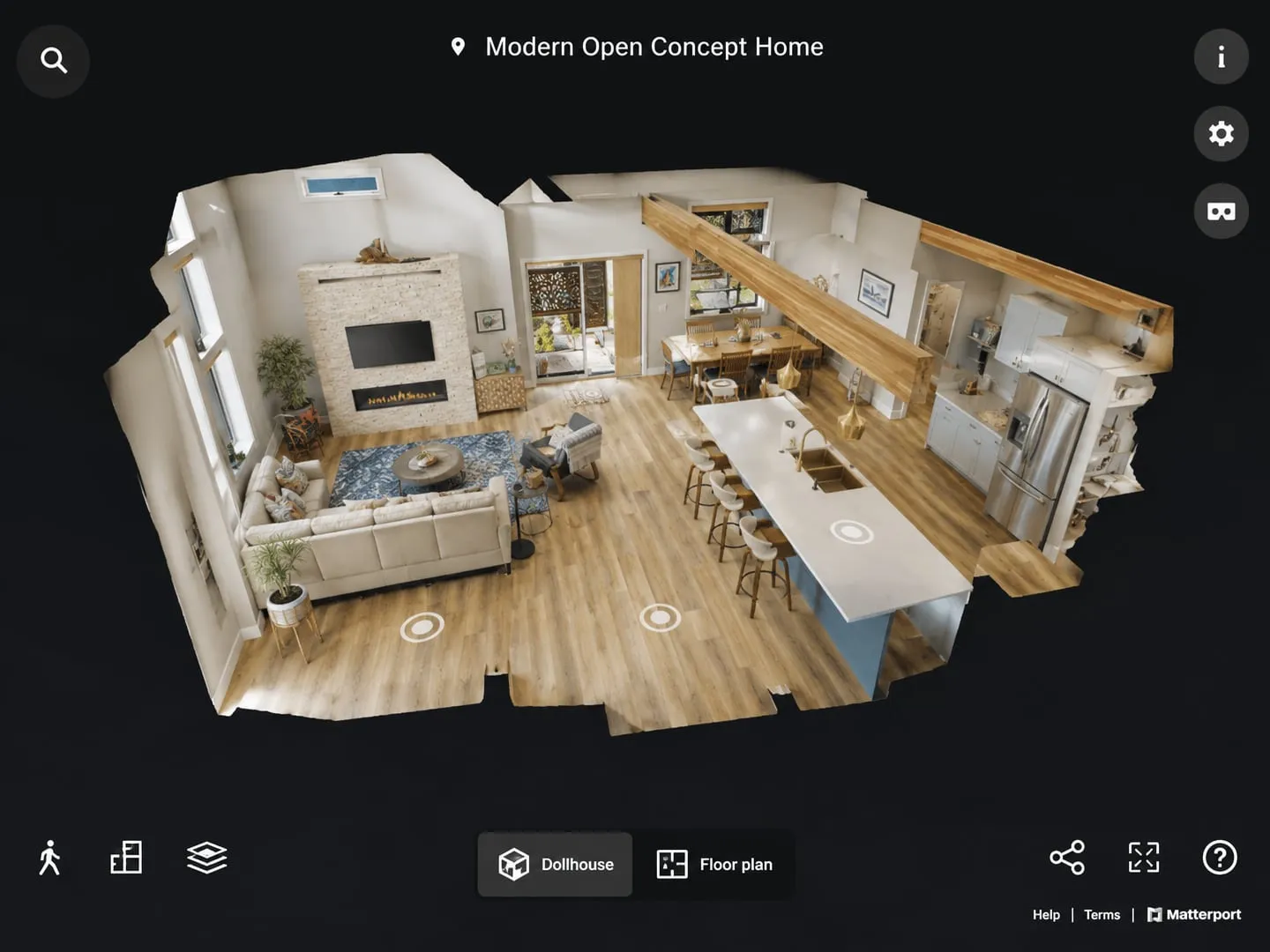 Matterport viewer in dollhouse mode, showing an open-plan home cut away from above