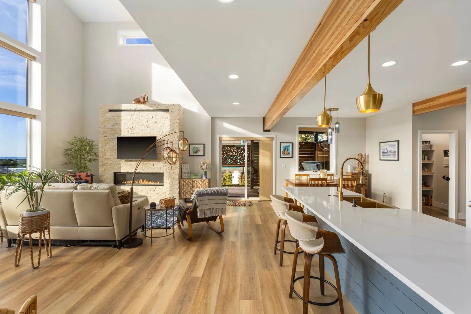 Open-plan great room flowing into the kitchen
