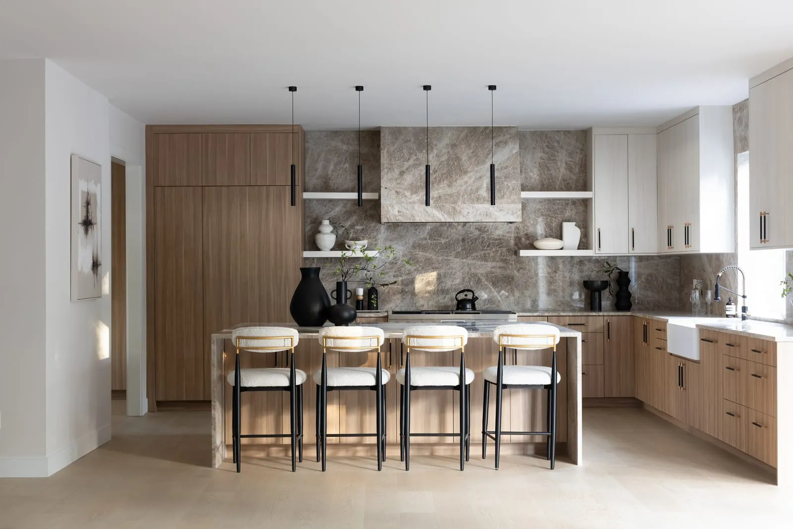 Kitchen island with stools drawn up to the counter